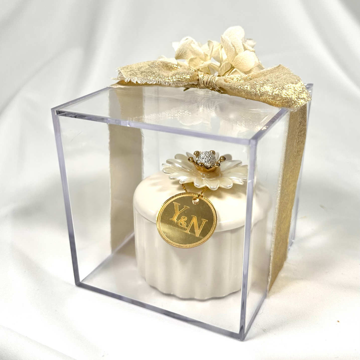 Ceramic jar with chocolates in acrylic box