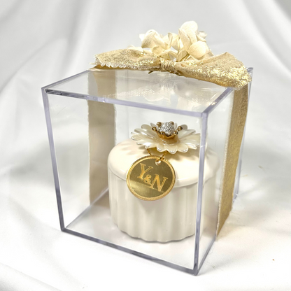 Ceramic jar with chocolates in acrylic box