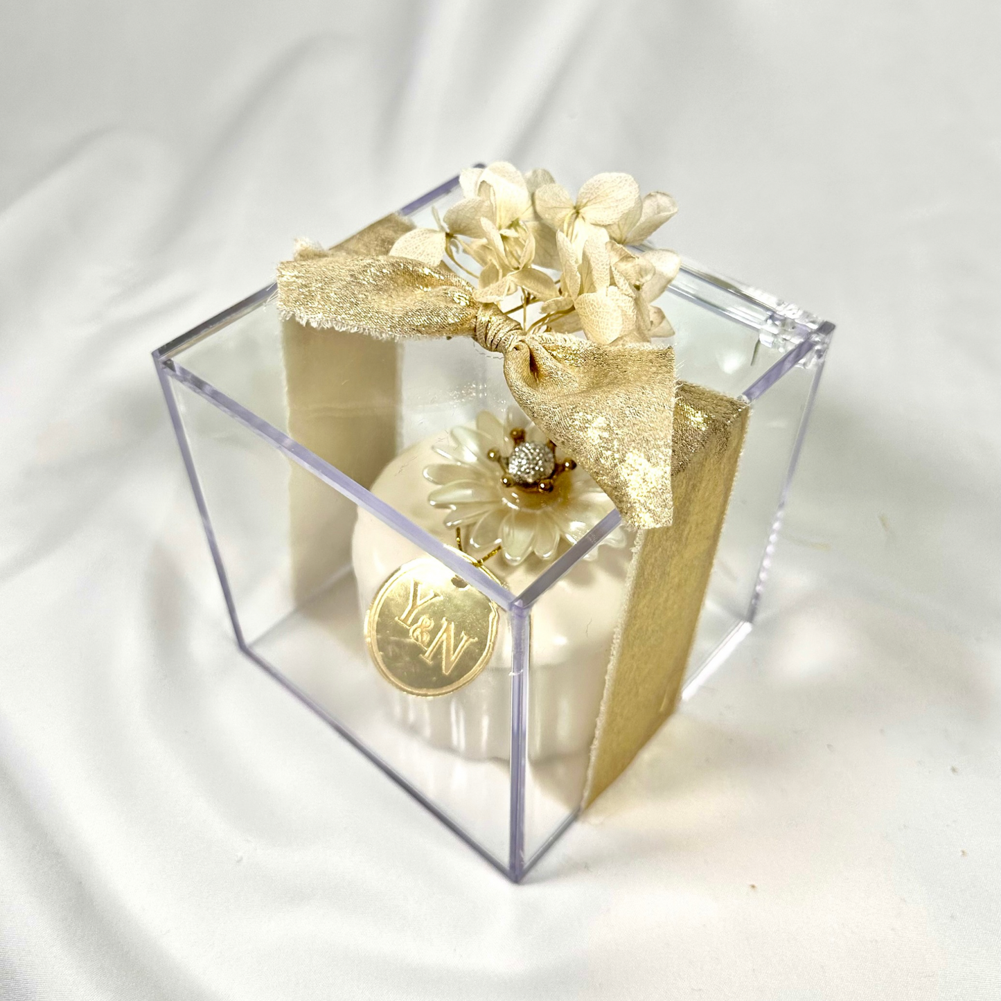 Ceramic jar with chocolates in acrylic box