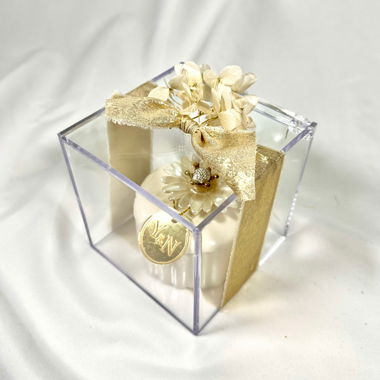 Ceramic jar with chocolates in acrylic box